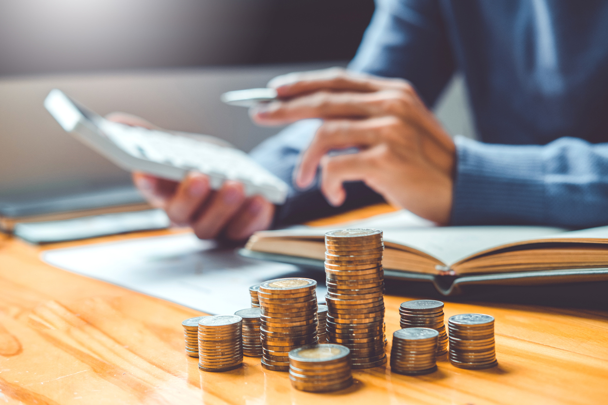a man calculating his investment